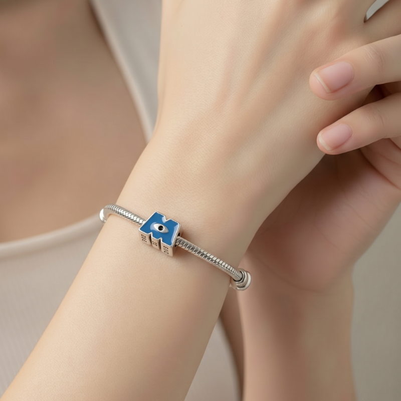 Charm Monstruos SA - Logotipo M Monster INC